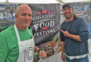 Niedenthal, alongside fellow chef and Key Largo restaurateur, Bobby Stoky, at a food festival in Guernsey in the British Channel Islands.